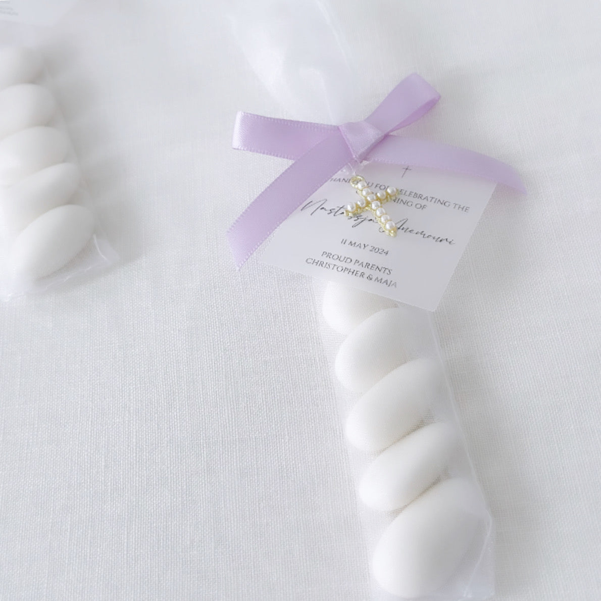 Slimline organza bomboniere with gold or silver pearl cross